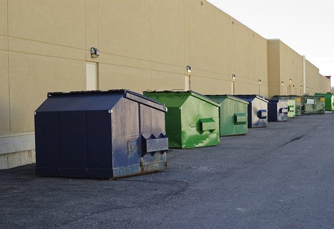 metallic dumpster units staged for construction garbage in Anaheim